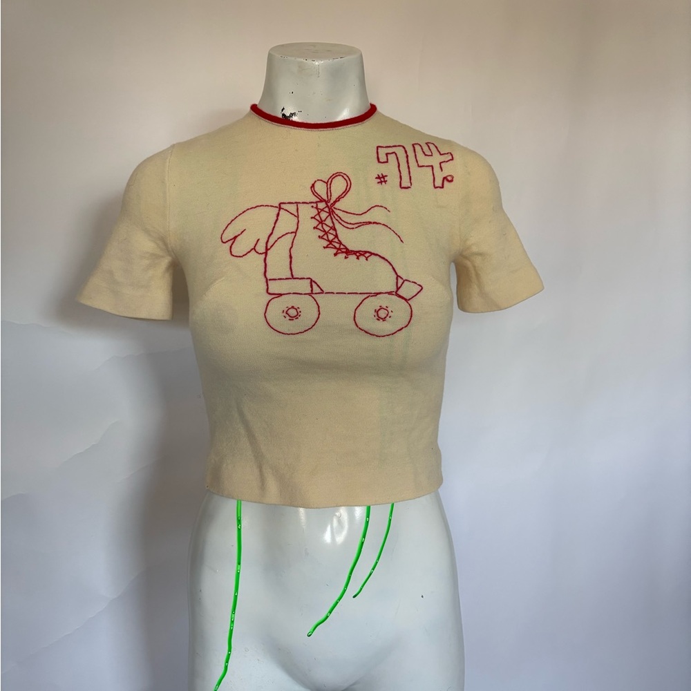 Cream 1970s roller-skate embroidered design